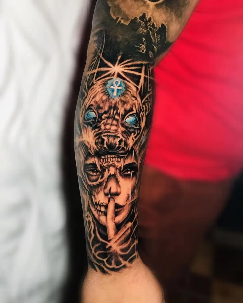 Anubis tattoo on his arm