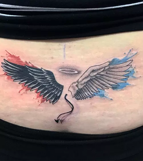 Tattoo of angel and demon wings