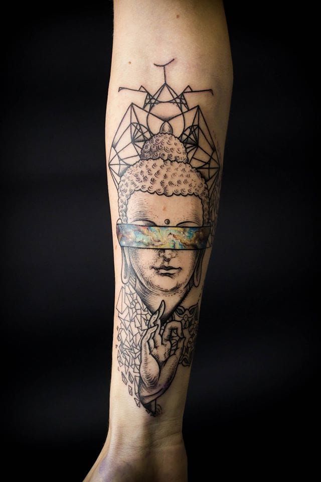 Buddha tattoo on the arm