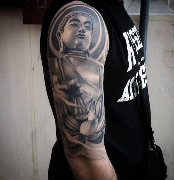 Buddha tattoo on the shoulder