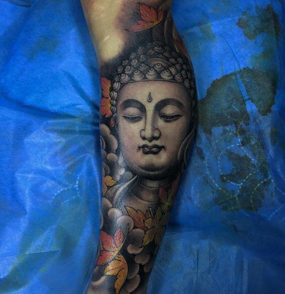 Buddha tattoo on the arm