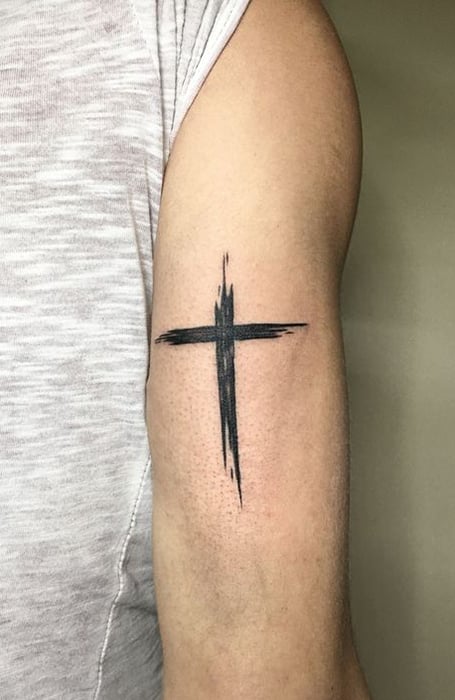 Tattoo a cross on your arm