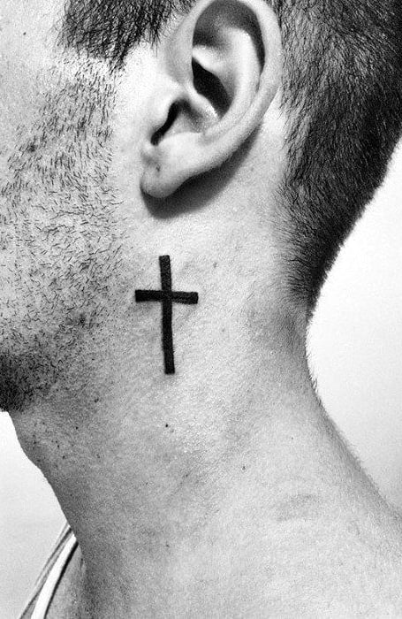 A simple cross tattoo