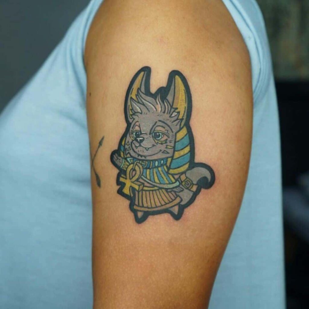 Anubis cartoon tattoo