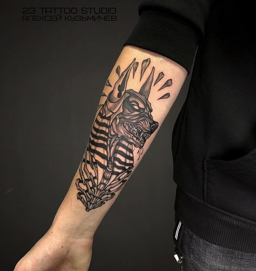 Anubis tattoo on the forearm