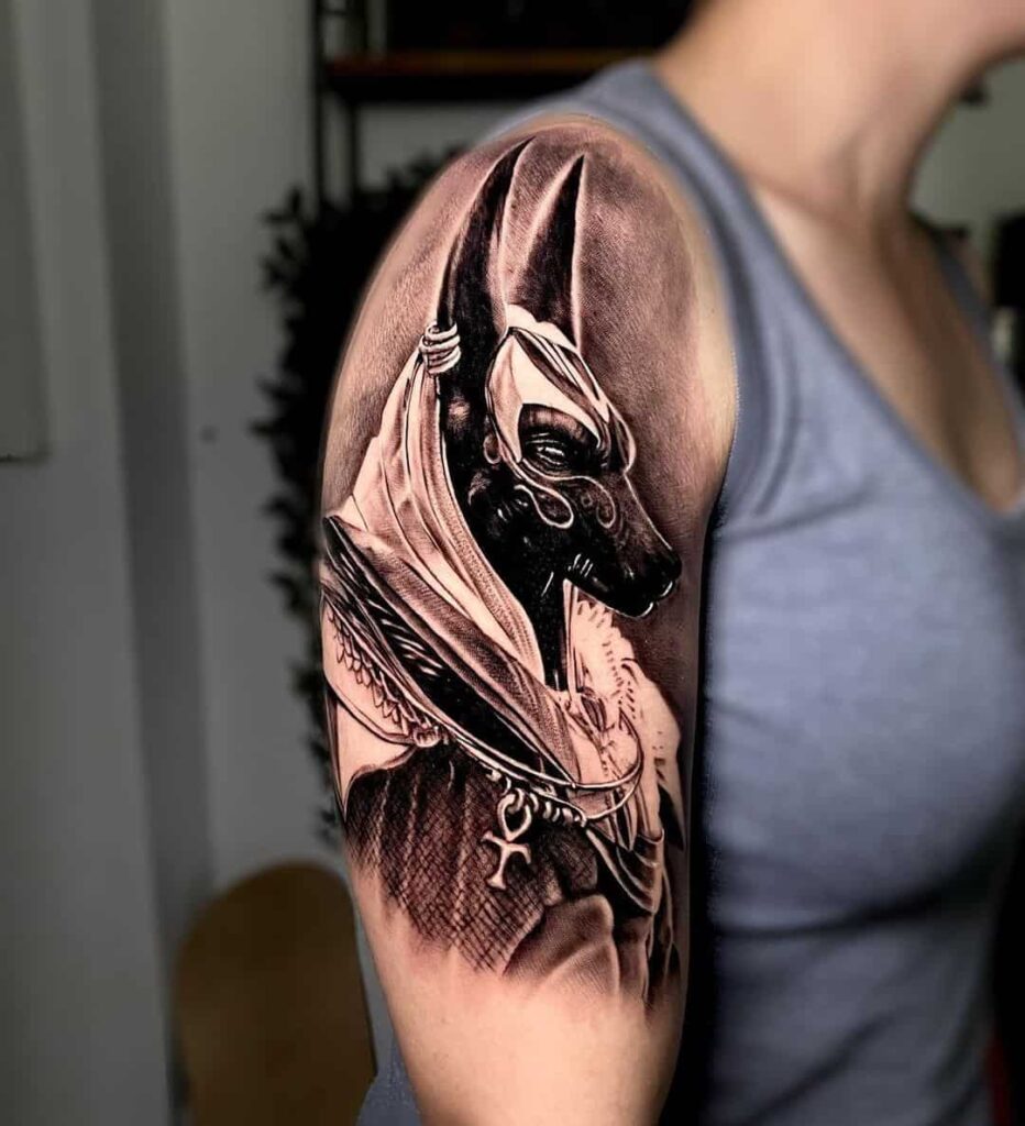 Tattoo of Anubis with half a sleeve