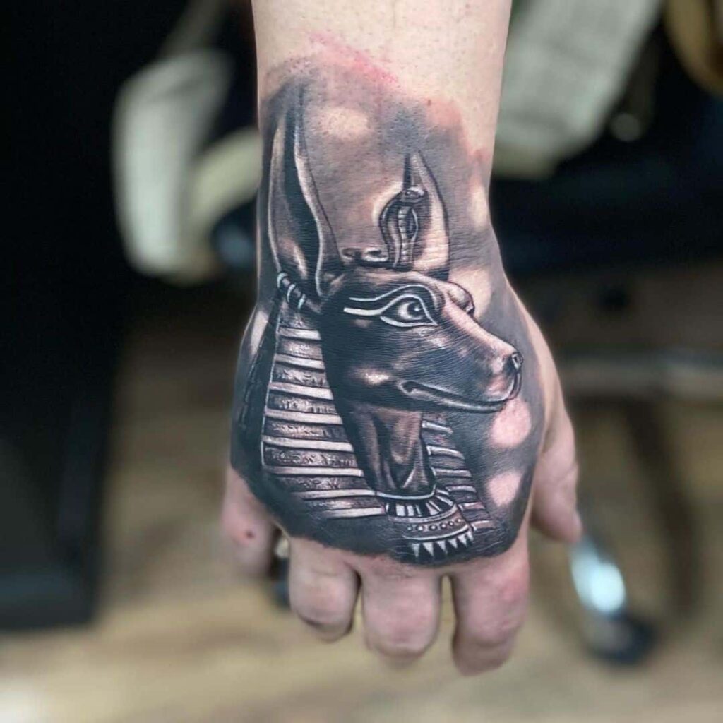 Tattoo of Anubis on his fist