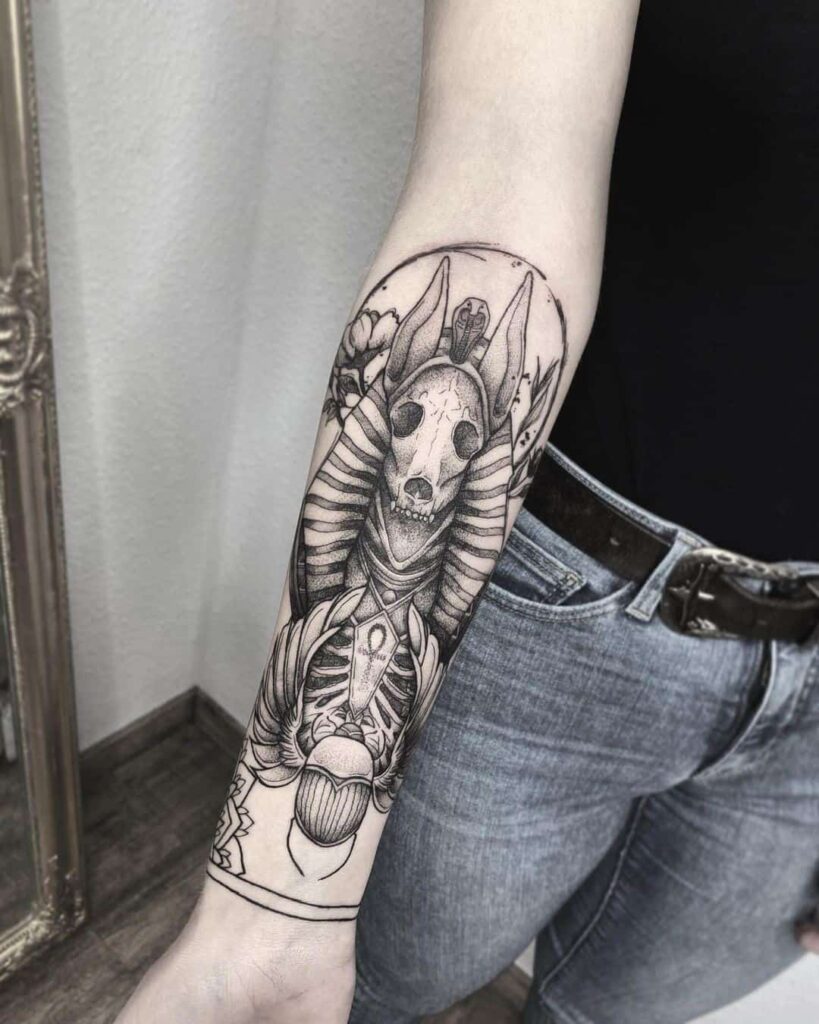 Tattoo of Anubis on the arm