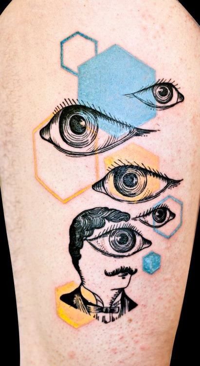 Tattoos in the Art Brut style on the arm