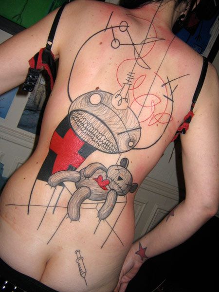 Tattoos in the Art Brut style on the whole back