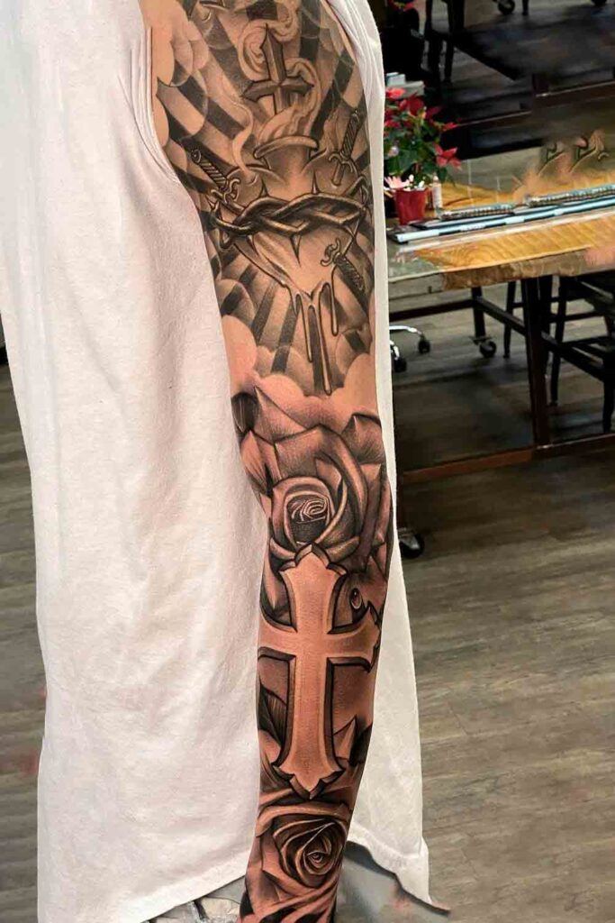 religious sleeve tattoos