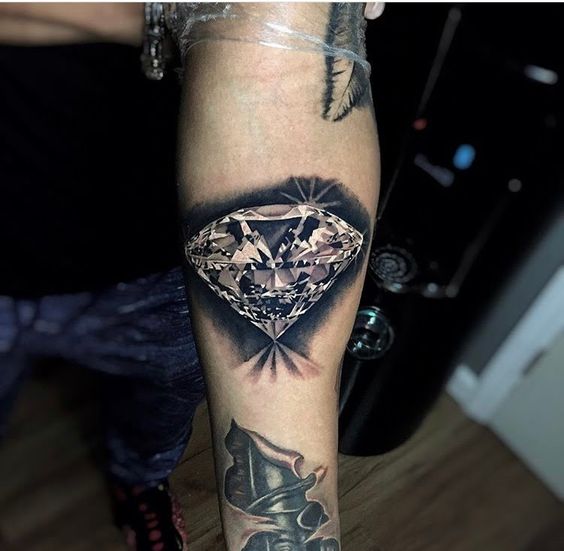 Diamond tattoo on hand