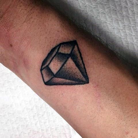 Diamond tattoo on hand