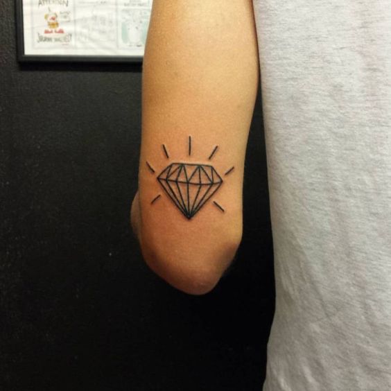 Diamond tattoo on hand