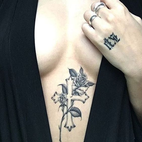 Cross tattoo on chest