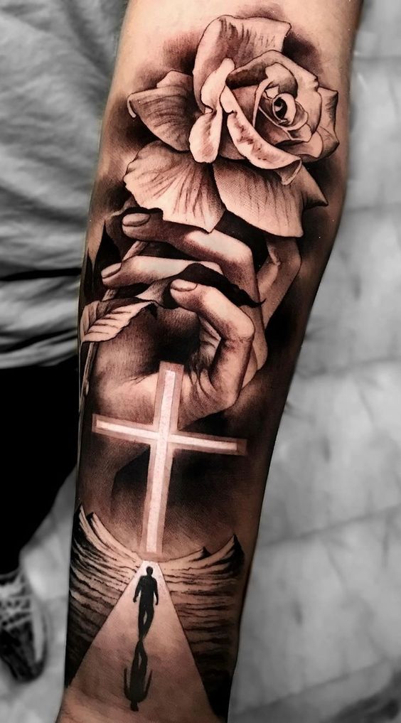 Tattoo of a cross on your arm