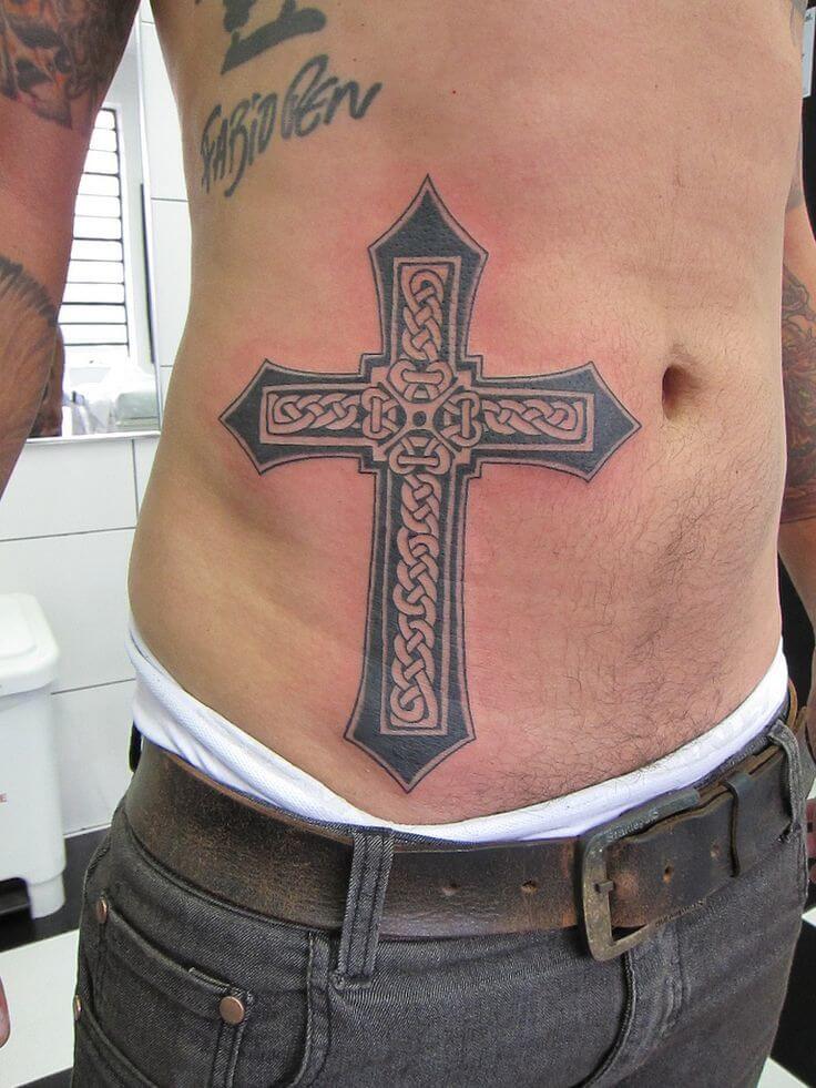 Tattoo of a cross on your stomach