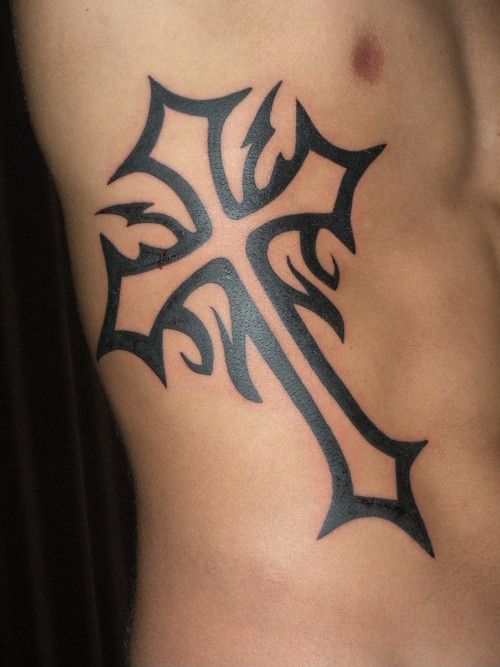 Tattoo of a cross on your stomach