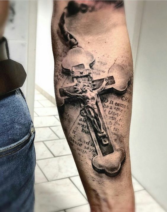 Tattoo of a cross on your arm