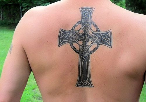 Tattoo of a cross on your back