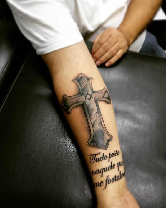 Tattoo of a cross on your arm