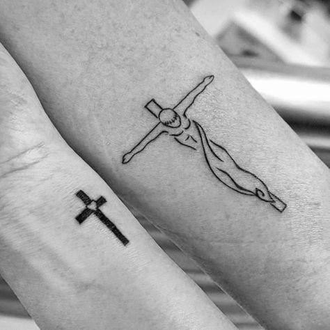 Tattoo of a cross on your arm