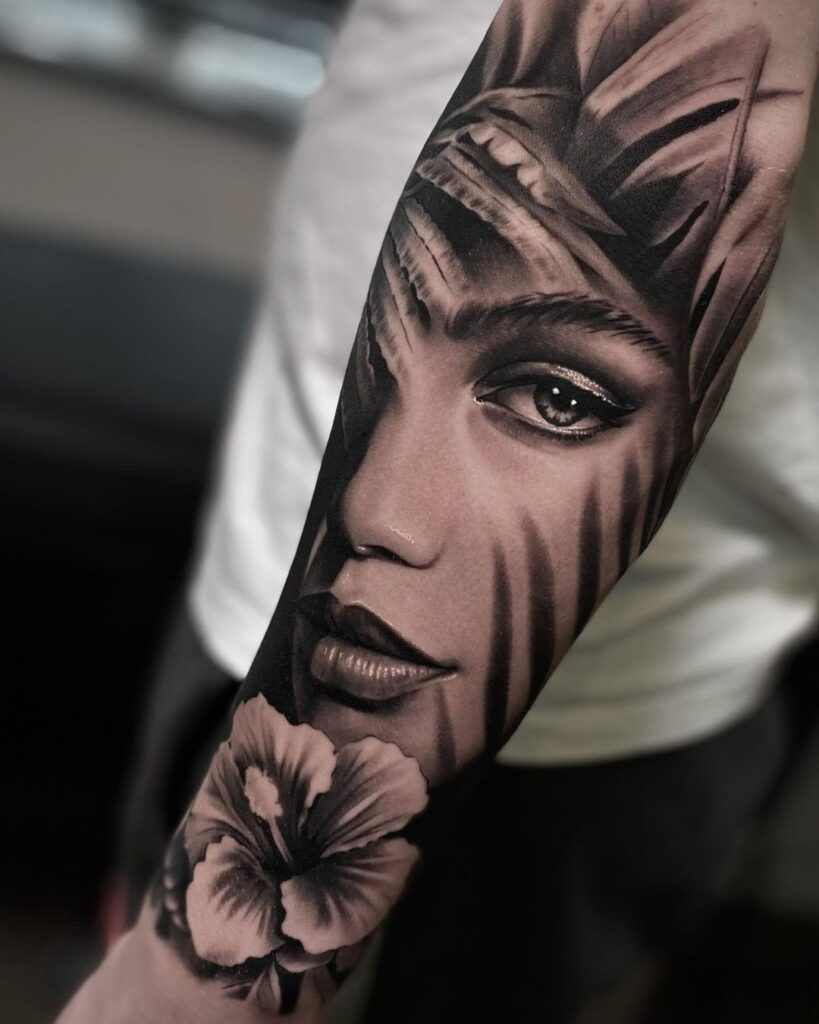 Realism style girl tattoo on the forearm