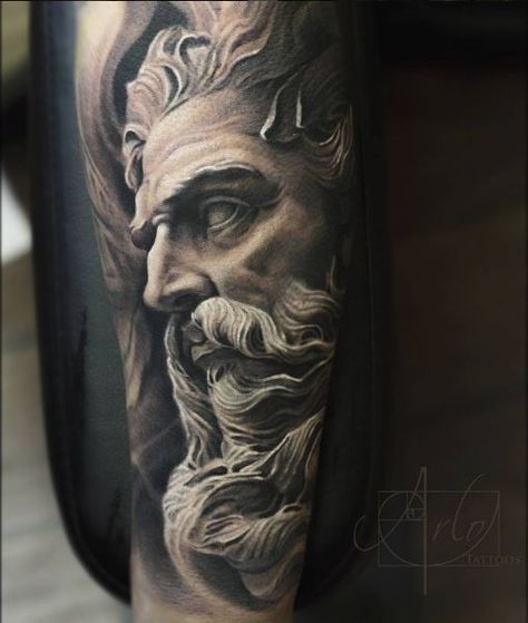 Tattoo of the god Poseidon on the shoulder