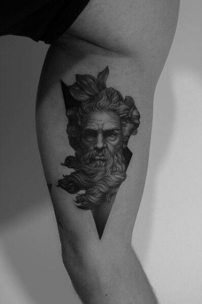 Poseidon tattoo on leg