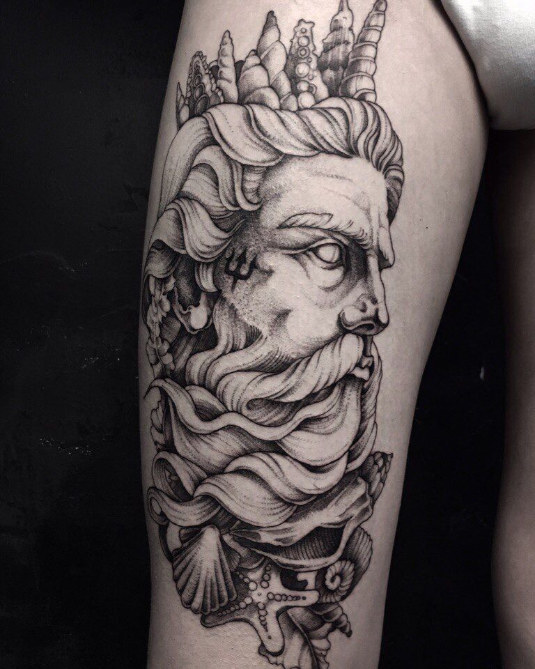 Tattoo of the god Poseidon on the arm