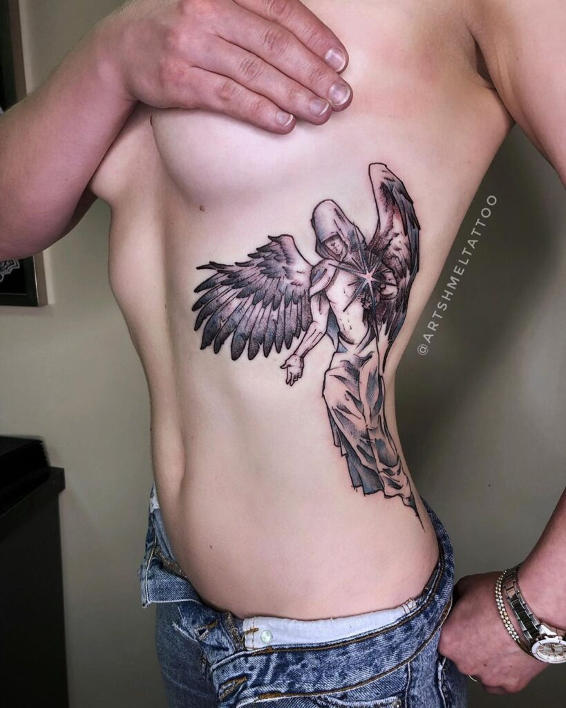 Tattoo of an angel on the side