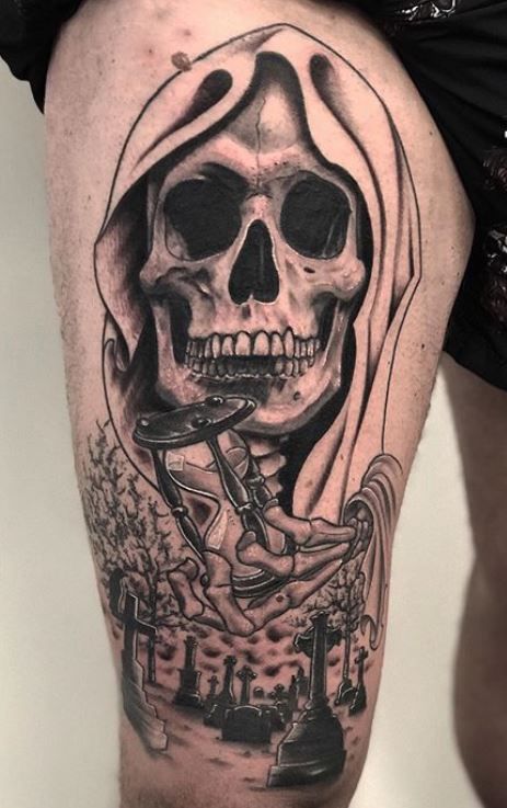 death with a scythe tattoo on his arm