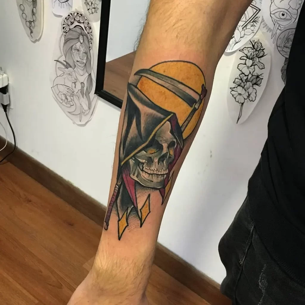 Grim Reaper tattoo on forearm