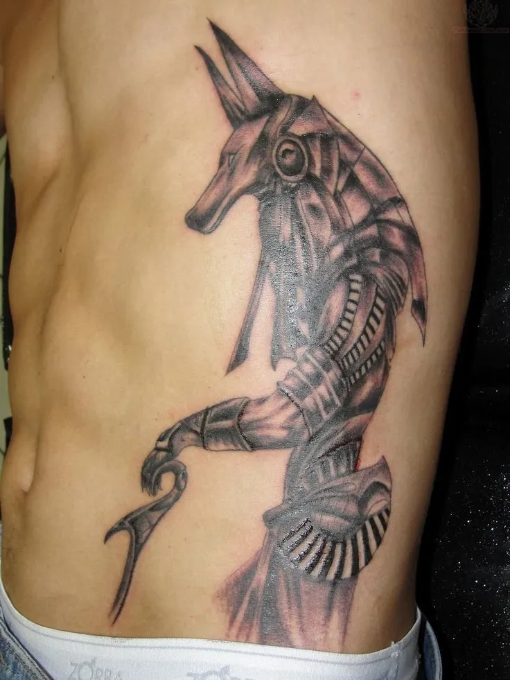 Tattoo of Anubis on the ribs