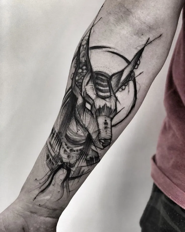 Tattoo of Anubis on the arm