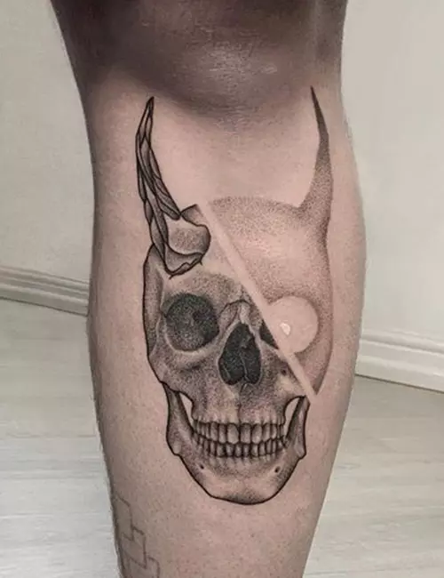 Demon dot tattoo on the knee