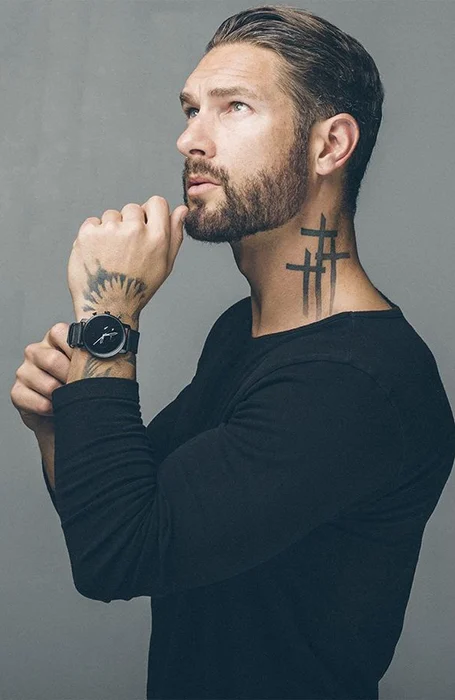 Tattoo with three crosses