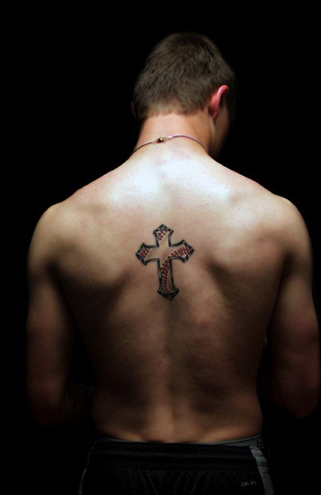 Cross tattoo on the back