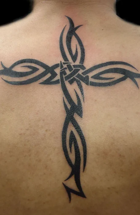 Tribal cross tattoo