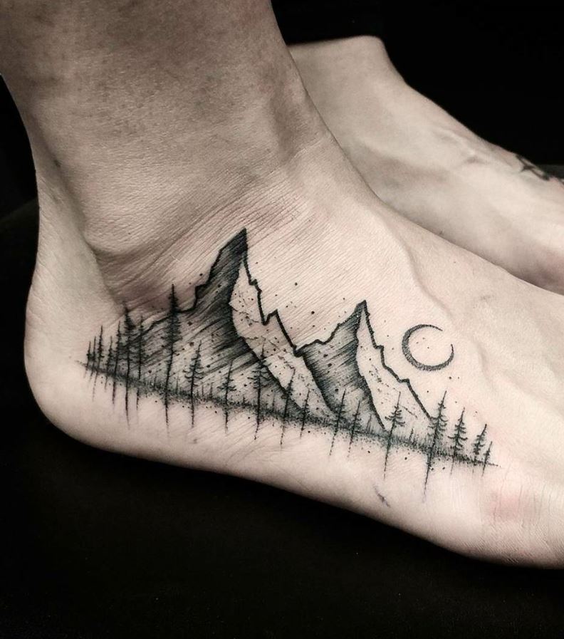 Tattoo of a mountain on your leg