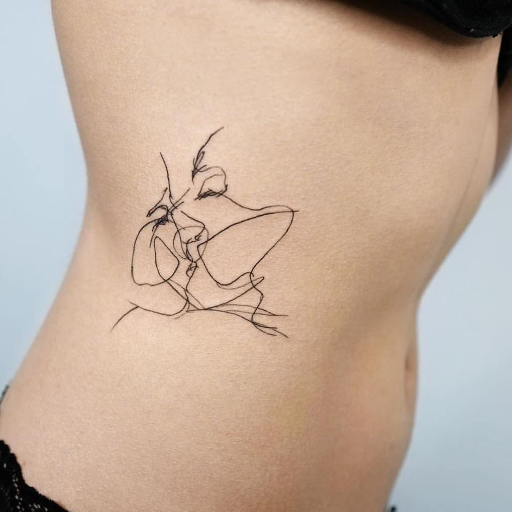 Tattoo on the side in a minimalist style