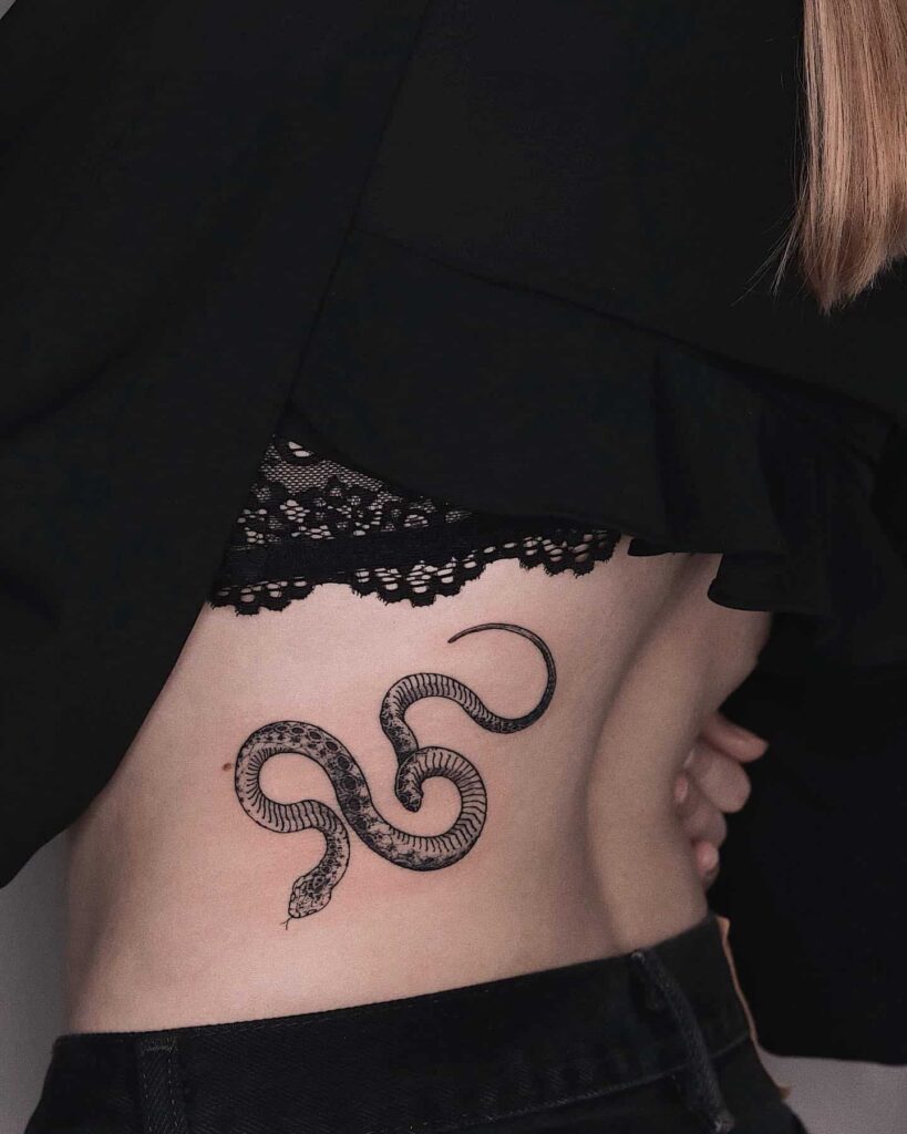 A snake tattoo on the side