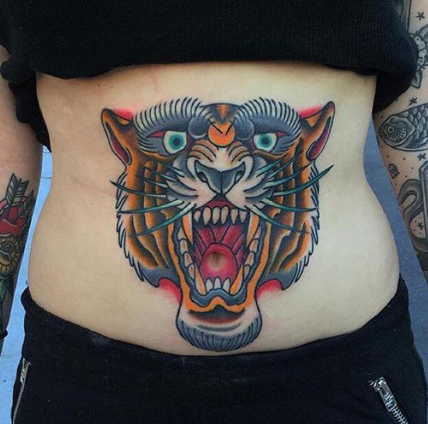 Tattoo of a cartoon tiger on the stomach