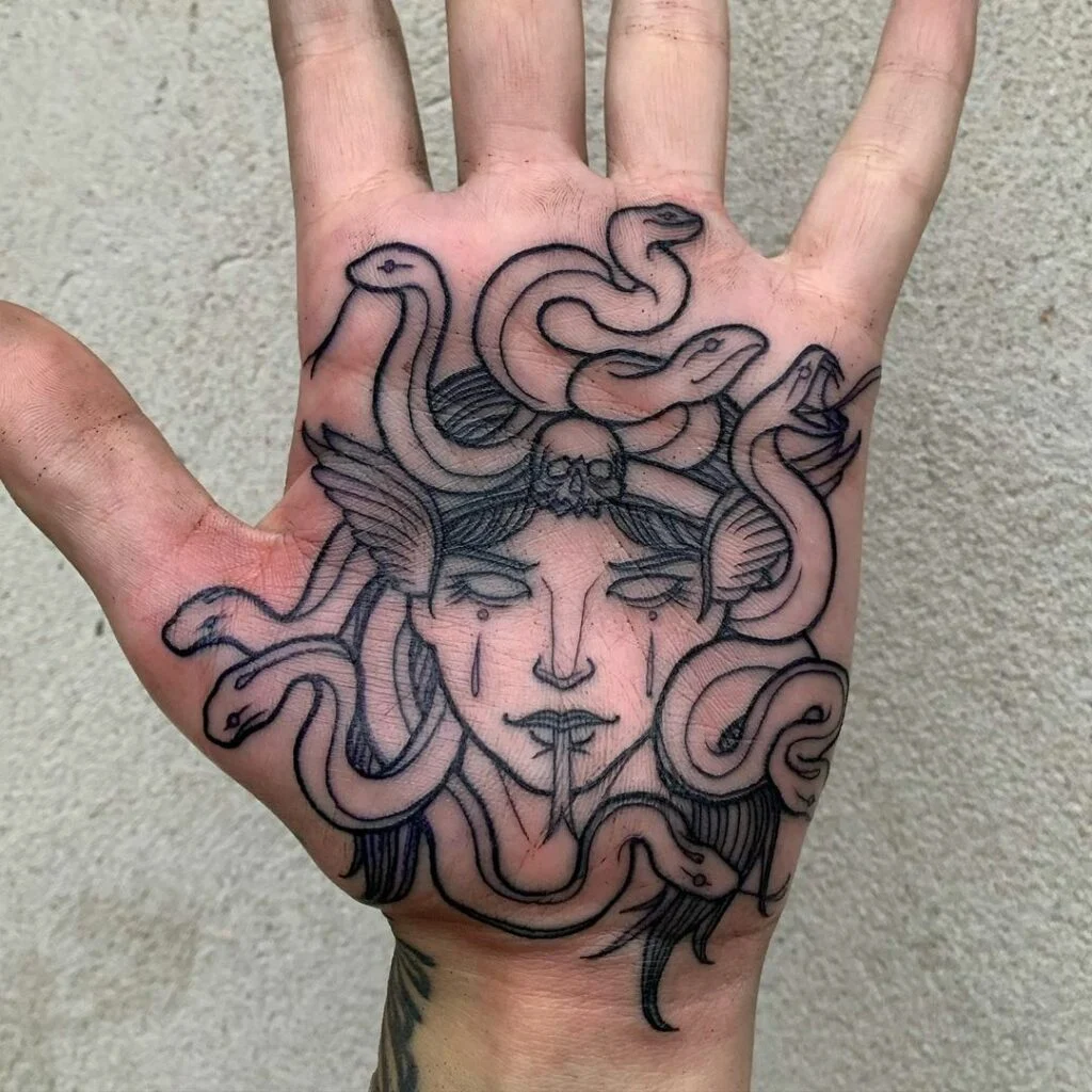 Ideas for tattoos on the palm of a man's hand