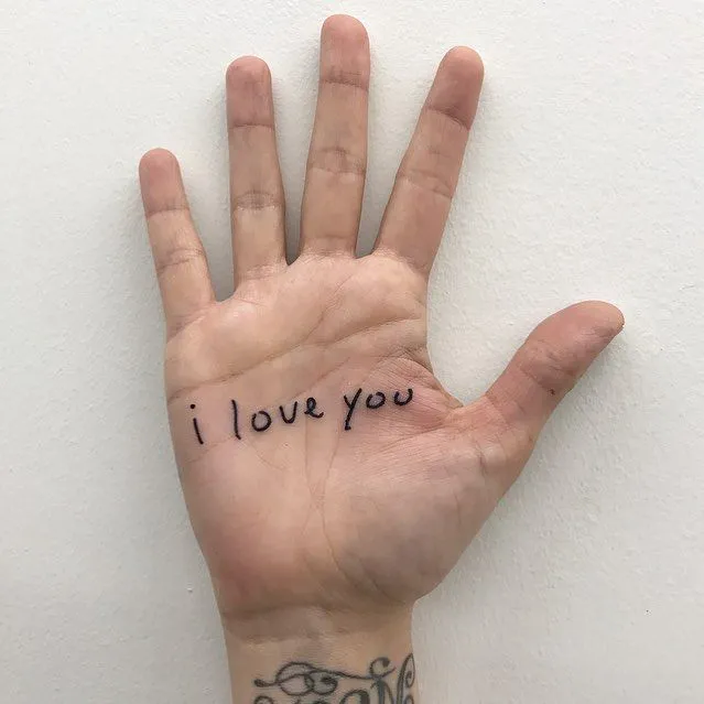 Tattoo with an inscription on your palm