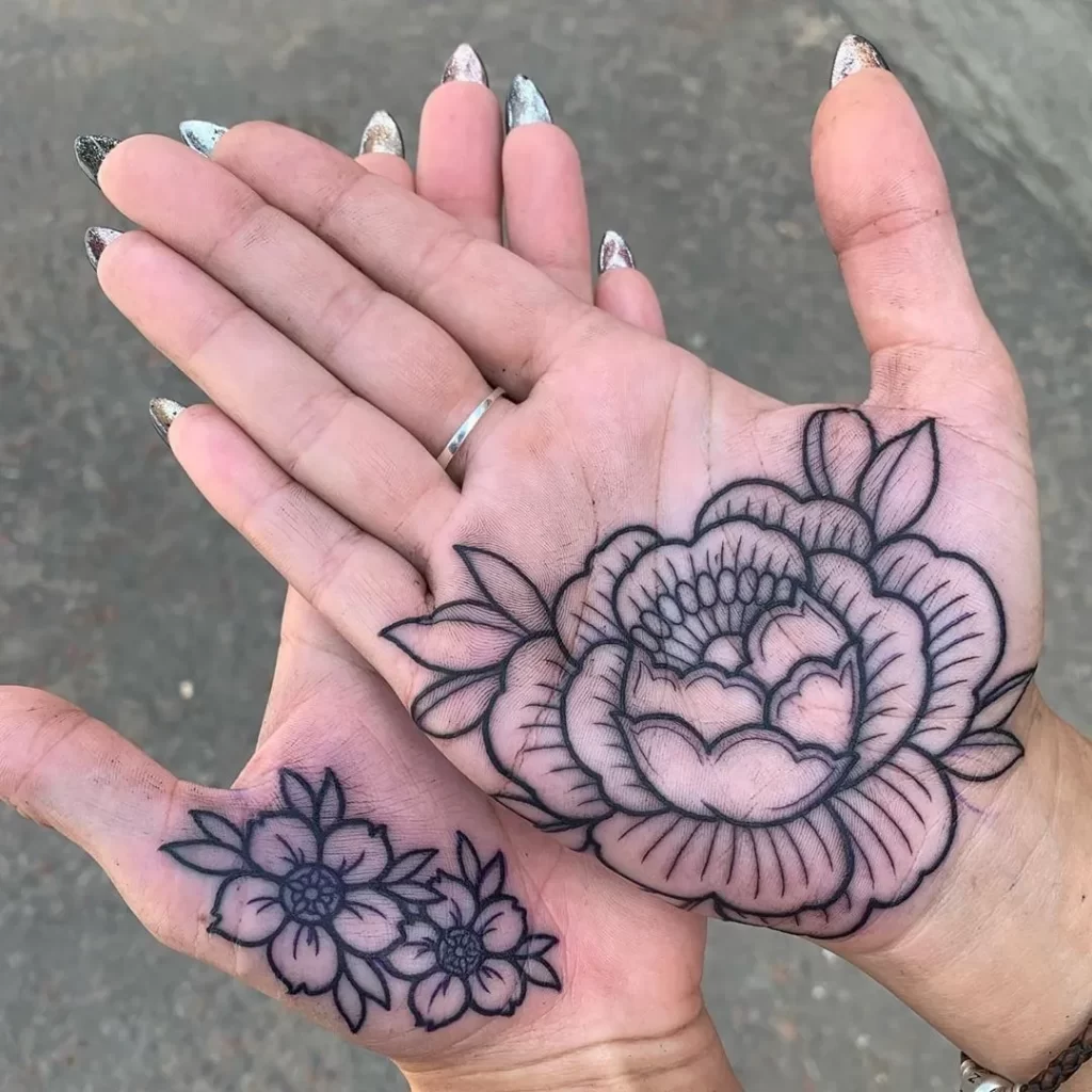 Flower tattoos on the palm