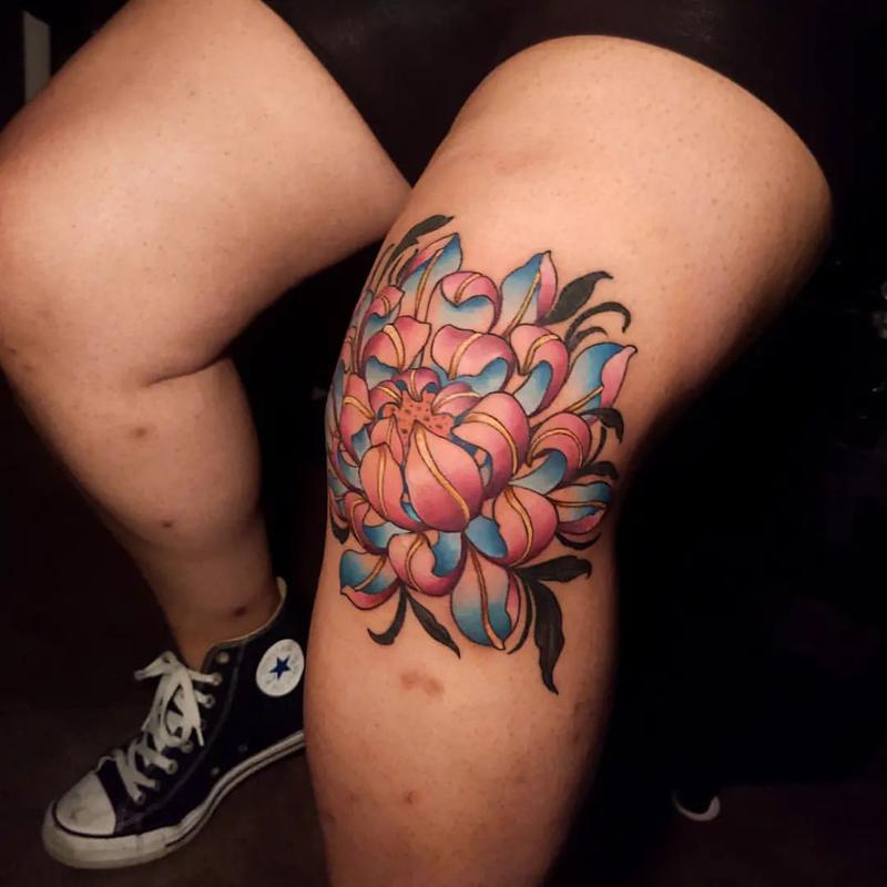 Floral tattoos on knees