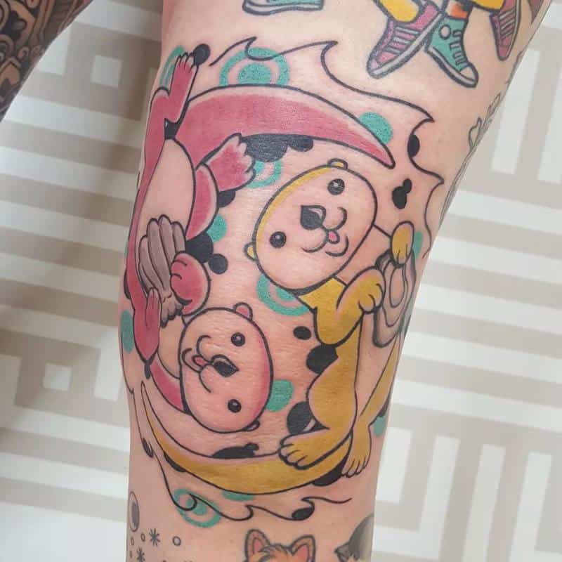 Cartoon tattoos on knees