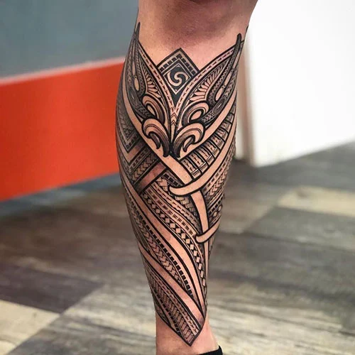 Ethnic shin tattoos