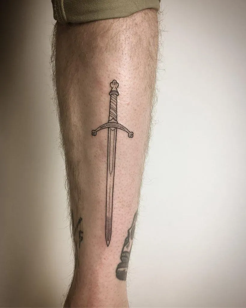 Sword tattoos on shins